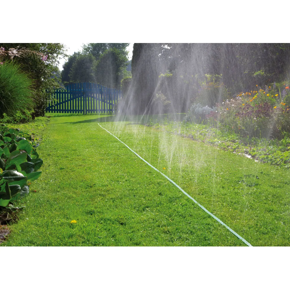 Schlauchregner mit Anschlußteilen 15 m grün ^ Gardena Discount