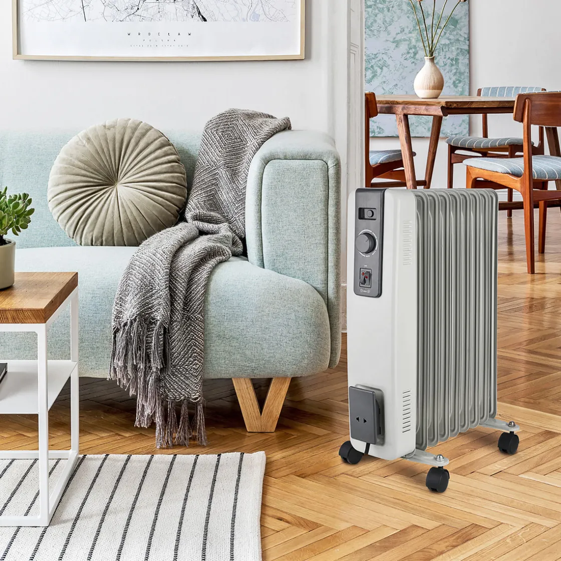Ölradiator 2000 W ^ New