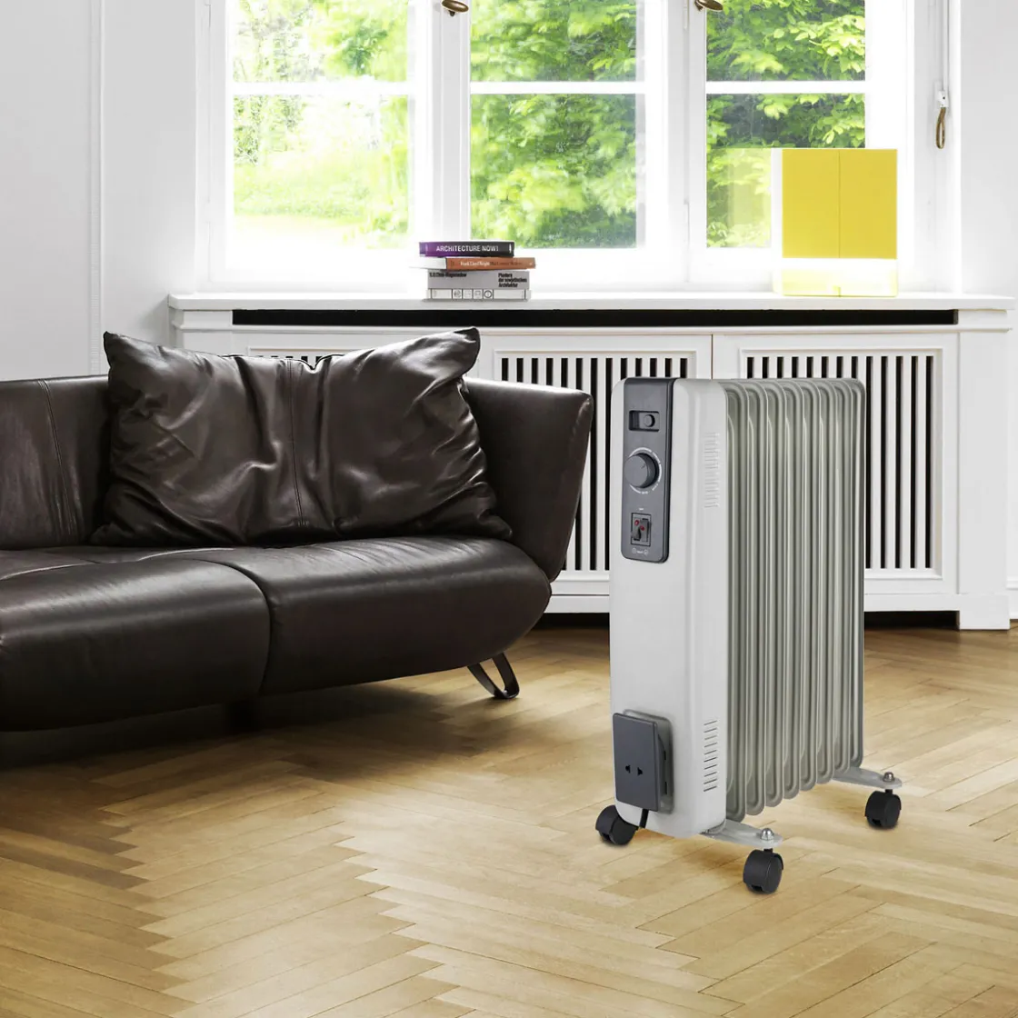 Ölradiator 2000 W ^ New